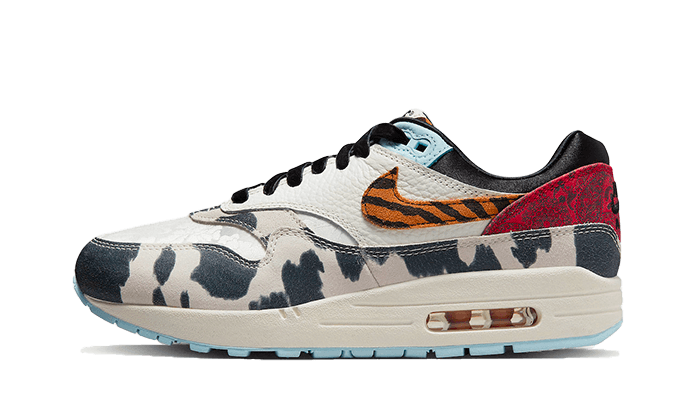 Nike Air Max 1 87 Tiger Swoosh Cow Print - image 1